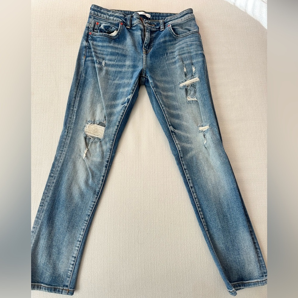 Distressed Blue Jeans